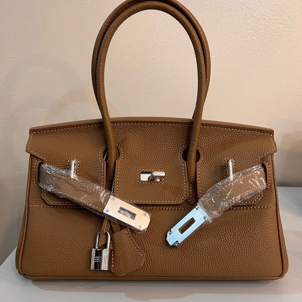 Genuine Leather Shoulder Bag, size 29, with silver hardware.